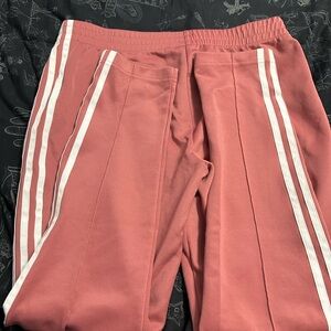 Adidas women’s pink track pants, slim fit size M (minor stain)